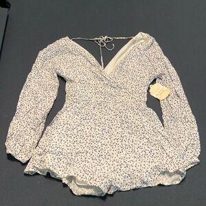 Blue and white floral print romper from Altar’d State